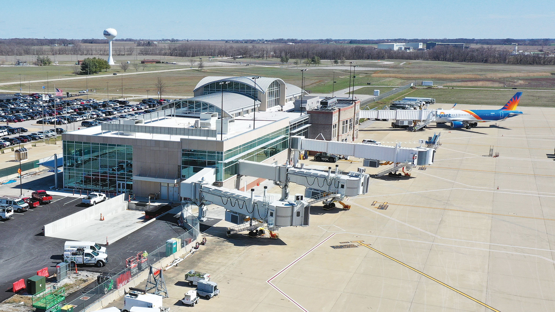 An overhead view of Mid America St. Louis Airport with terminal and planes.